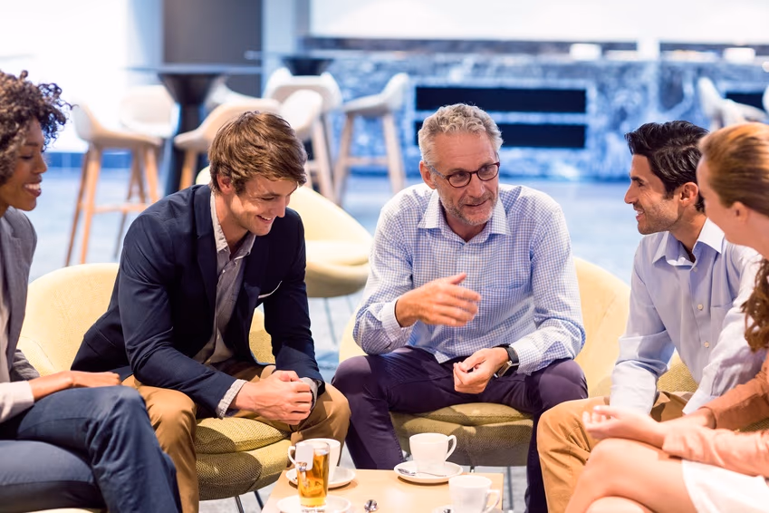 Business people having a discussion in cafeteria